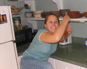 Rockin’ the Kitchen. You can’t see it, but she’s holding shrimp. A bag of shrimp makes me do that too.