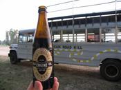 Harviestoun Brewery "Old Engine Oil". In the background is the Bus we took to the drive in.