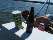 Pringles seemed to be the perfect companion to a cold barley wine on a pontoon in a minnesota lake. But who’s that bozo in the background.