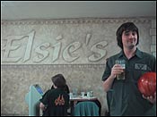 Here’s me enjoying a glass of good stuff in front of the elsies sign